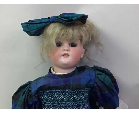 SIMON & HALBIG, BISQUE HEAD SOCKET DOLL AND ANOTHER BY SCHOENAU & HOFFMEISTER late 19th/early 20th century, open/close blue g