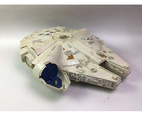 VINTAGE STAR WARS MILENNIUM FALCON SPACESHIP by Palitoy, boxed, together with an AT-AT Walker, looseQty: 2