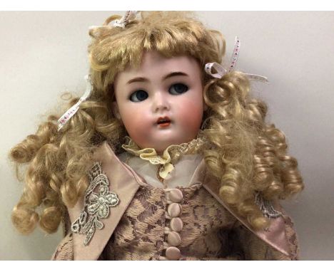 SIMON & HALBIG / KAMMER & REINHARDT, BISQUE HEAD SOCKET DOLL AND ANOTHER SMALLER late 19th/early 20th century, open/close blu