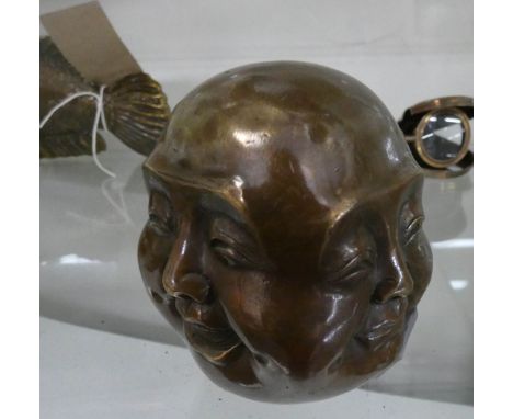 An Oriental four faced Buddha style bronze paperweight  