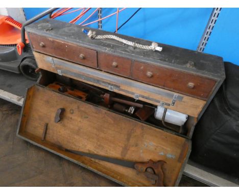 An old carpenters fitted tool box with a quantity of old tools 