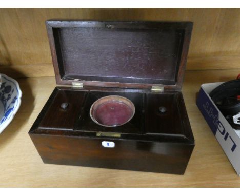 A Regency rosewood tea caddy with interior fittings