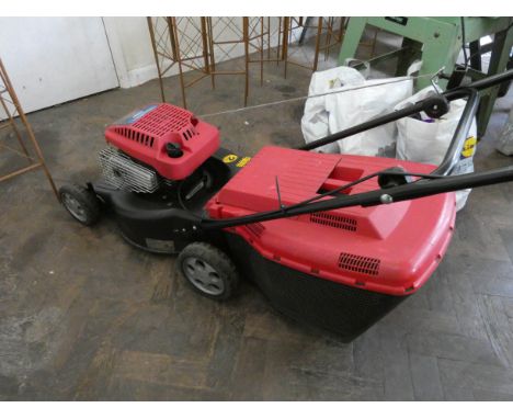 A Mountfield Briggs &amp; Stratton petrol engine lawn mower with grass collection box 