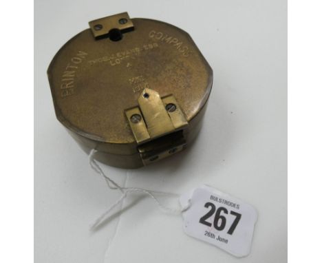 A circular Brunton brass compass 