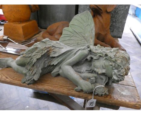 A bronze effect sleeping fairy