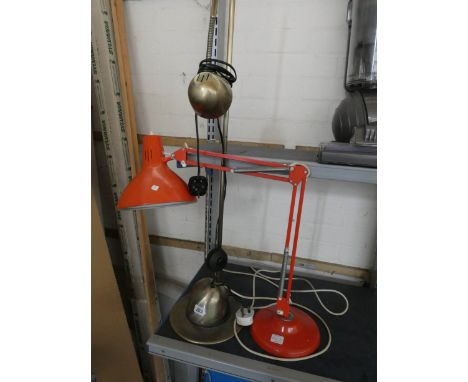 A red angle poise lamp and a glass effect adjustable reading lamp 