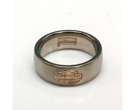 Sterling silver Harley Davidson logo on a silver tone titanium band with satin finish. Titanium and 925 stamped inside band. 