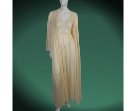 Lingerie has lace edged gown and robe. Butterfly bodice on gown. Robe closes with sash. Original tags - Olga. Issued: 20th ce