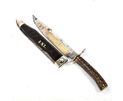 A California Bowie Knife by George Wostenholm, etched and gilded blade with staghorn grip, original leather sheath stamped IX