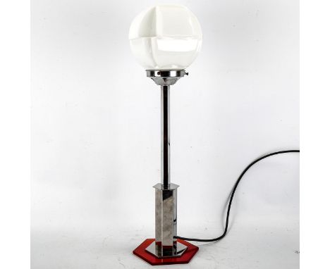 An Art Deco chrome plate and perspex table lamp, with white glass shade, height 57cm 