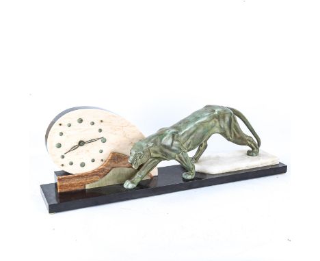 An large Art deco marble faced clock with a bronzed spelter panther figure, length 77cm 