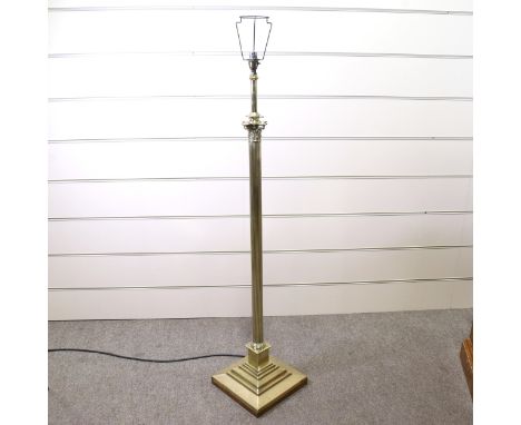 A Victorian brass Corinthian column telescopic standard lamp, converted to electric 
