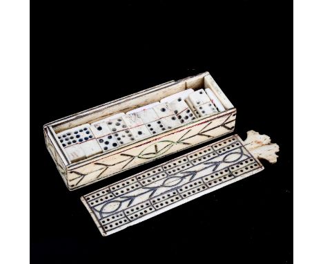 A Napoleonic Prisoner of War ox-bone games box, with cribbage marker lid enclosing original set of dominos, length 13cmSmall 