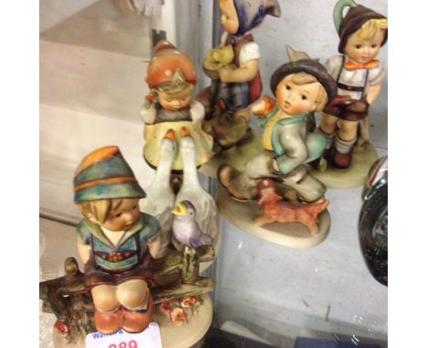 FIVE HUMMEL FIGURES CCONDITION:  BOY SITTING ON FENCE IS ONLY PIECE WITH DAMAGE/REPAIR AS PICTURED. 