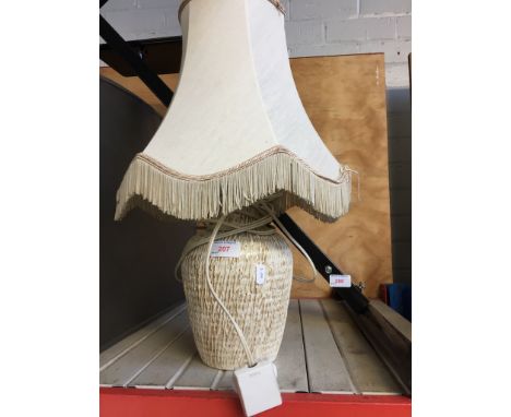 A POTTERY TABLE LAMP