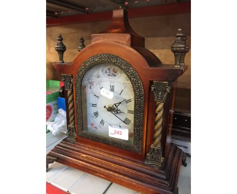 A REPRODUCTION MANTLE CLOCK