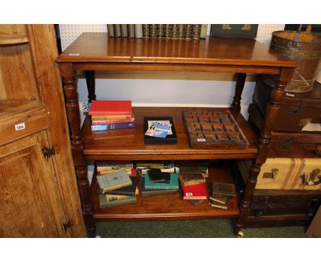 19thC Mahogany 3 Tier stand with turned supports over ceramic casters 