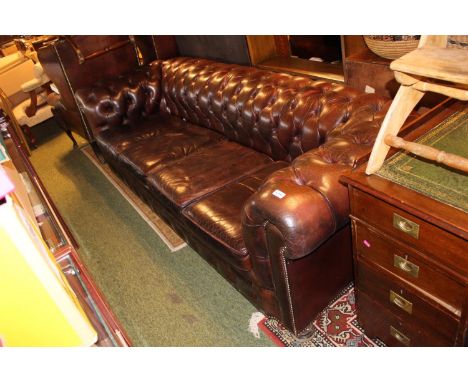 Good quality Leather Chesterfield Button back Maroon sofa of 3 seats. 230cm in Length 