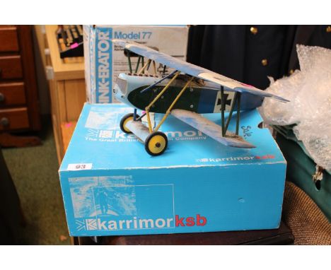 Model of a WWI Bi plane and other parts in box 