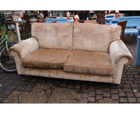 2 Seater Upholstered sofa on turned feet 