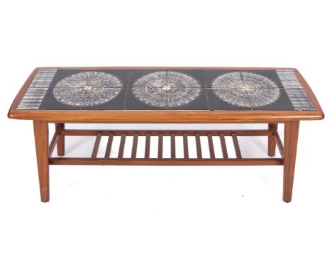 A teak and tile topped coffee table, retailed by Heals, mid-20th century; the oblong top inset with sixteen Malkin Johnson bl