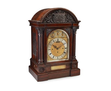 LARGE EDWARDIAN ROSEWOOD CHIMING BRACKET CLOCK, SEARLE & CO., LONDON  EARLY 20TH CENTURY   the domed top with a carved coat o