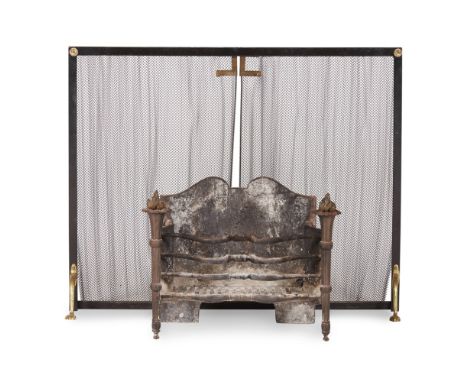 CAST IRON FIRE BASKET AND STEEL AND BRASS SPARK GUARD  19TH CENTURY   the basket with flaming torch uprights and an arched ba