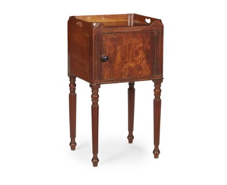 GEORGE III MAHOGANY NIGHT COMMODE  18TH CENTURY   the three-quarter galleried top above a panel door raised on turned reeded 