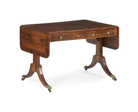 REGENCY ROSEWOOD SOFA TABLE  EARLY 19TH CENTURY   the rounded rectangular crossbanded top above one real and one dummy drawer