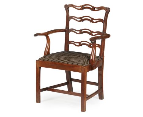 SCOTTISH GEORGE III MAHOGANY ARMCHAIR  18TH CENTURY   the pierced ladder back over a drop-in seat flanked by serpentine arms 