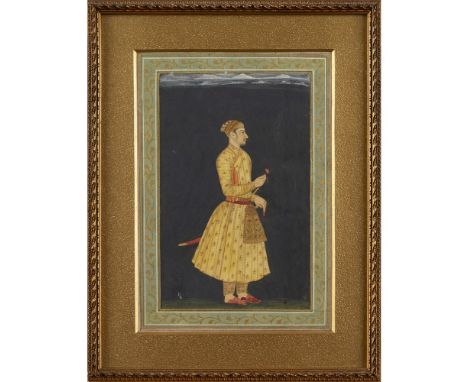 MUGHAL STANDING PORTRAIT OF A PRINCE  MID 18TH CENTURY   opaque pigments heightened with gold on paper, depicting the full pr