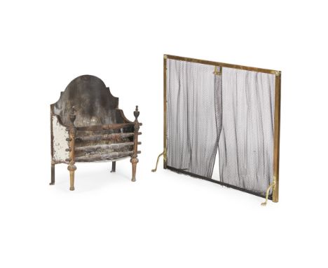 CAST IRON AND BRASS FIRE BASKET AND BRASS SPARK GUARD  19TH CENTURY   with urn finials, rams' masks and an arched backplate; 