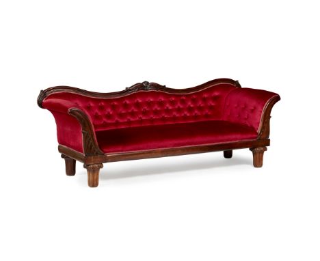 GEORGE IV ROSEWOOD FRAMED SOFA  EARLY 19TH CENTURY   the serpentine channel moulded top rail carved with lotus above a button