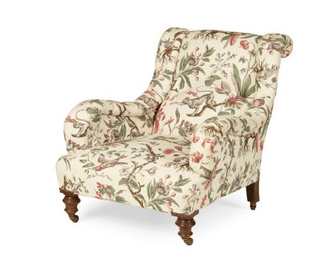 VICTORIAN UPHOLSTERED ARMCHAIR  19TH CENTURY   the low back and sloping scroll arms above a deep padded seat, raised on turne