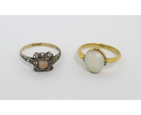 A 9ct yellow gold and opal dress ring, size O and a further 9ct gold dress ring, size P, combined approx 5.7g (2).