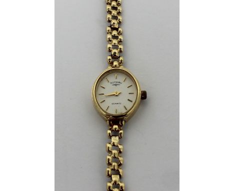 Rotary; a 9ct yellow gold ladies' wristwatch on a bracelet link chain. CONDITION REPORT Weight approx 9.9g.