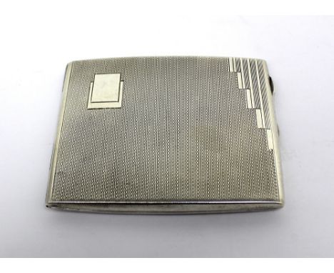 A George VI hallmarked silver rectangular cigarette case with engine turned detail, Birmingham 1939, S M Levy Ltd, width 10cm
