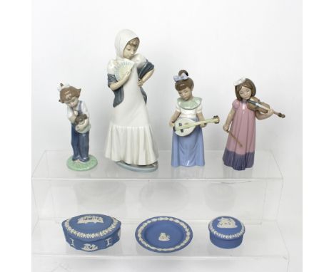 Four Nao figures; a young girl playing the mandolin, a young girl playing the violin, a lady in Spanish costume with fan and 