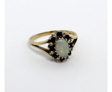 A 9ct yellow gold floral-set dress ring with central oval opal, size N 1/2, approx 2.4g.