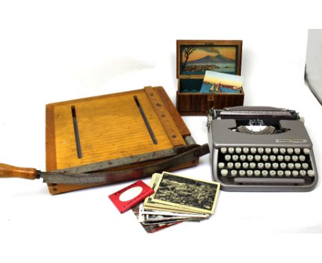 A mid-20th century oak 'Empire Harona' typewriter, a 'Dryad Ltd Leicester' Italian souvenir jewellery box containing postcard