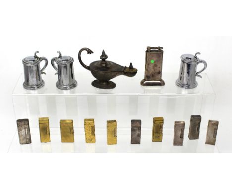 Fifteen various Dunhill lighters to include table lighters in the form of Aladdin's lamp, stein tankards, a large cylindrical