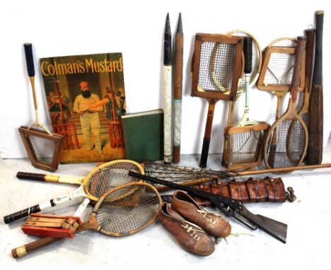 A quantity of vintage sporting equipment to include 'Grays of Cambridge' and 'Jack Sharp' tennis rackets and other makes, a l