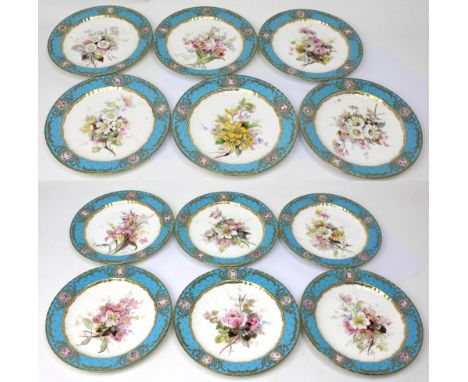 Royal Crown Derby; a set of twelve dessert plates with central painted floral motif and further gilt and enamel decoration, n