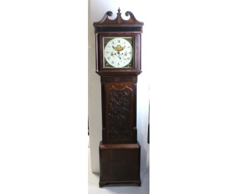 An early 19th century oak longcase clock, the broken swan neck pediment above square painted dial, inscribed 'Alker, Wigan' w