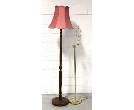 A reproduction mahogany standard lamp with turned and reeded column, height 58cm and a contemporary brass example (2).