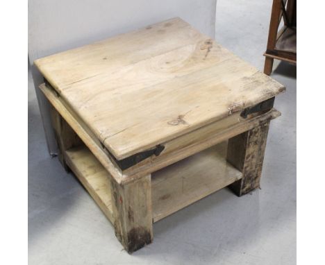 An Indian square side table with one lower shelf, on block supports with iron hinge decoration, 60 x 60cm.