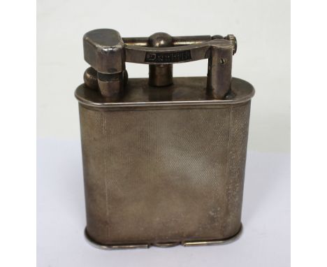 Dunhill; a 'Giant' engine-turned decorated table lighter, base stamped 'Dunhill Regd Design no.737418' and 'Patent no.390107'