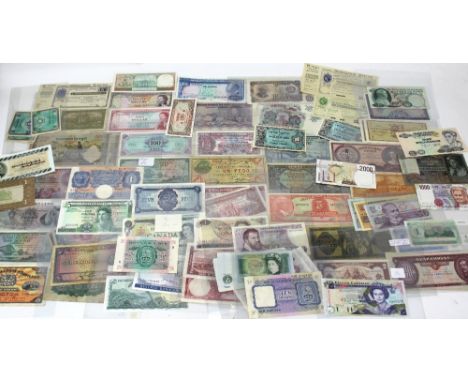 A collection of British and Territory banknotes to include Military Authority 2/6 (K), 10/- and others, £1 Peppiatt D74E 0803
