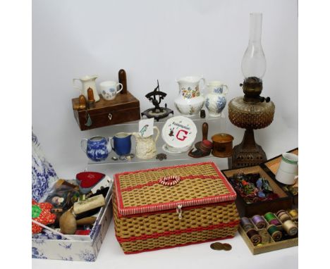 Three vintage sewing boxes; one c1950s raffia box with a quantity of sewing items, a vintage wooden box with a small quantity