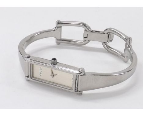 Gucci stainless steel lady's bangle watch, ref. 1500L, quartz, 12mm (no glass) (W8H71K)  .  Condition Report:  .  Movement - 